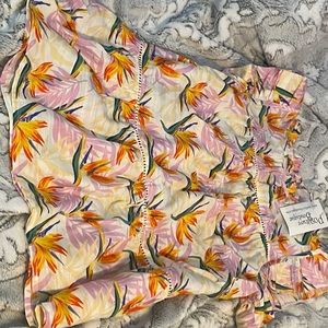 The size is small its from poshture boutique it has yellows white and pink color